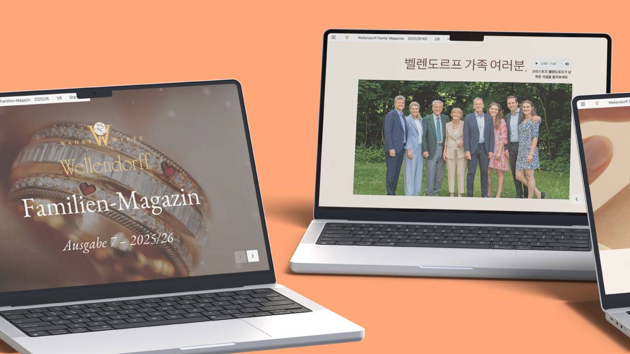 Mehrere aufgeklappte Laptops zeigen Startseite und Editorial des digitalen Wellendorff Familien-Magazins in deutscher und japanischer Sprache